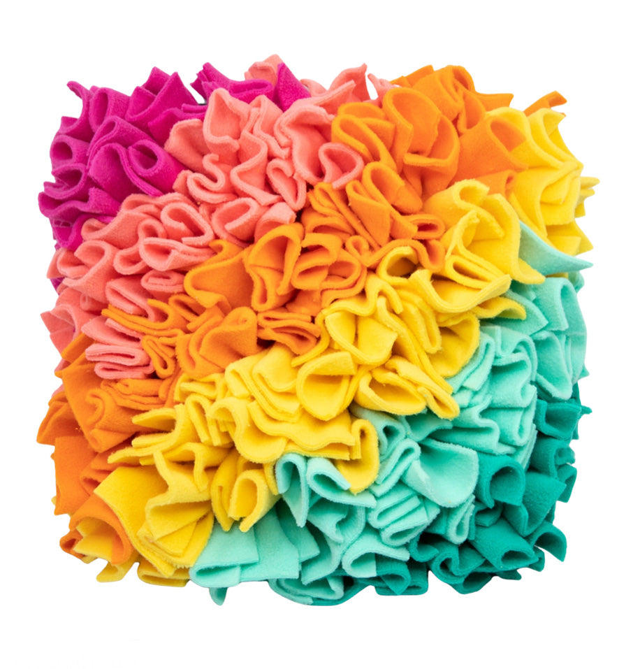 snuffle mat with pink yellow and teal